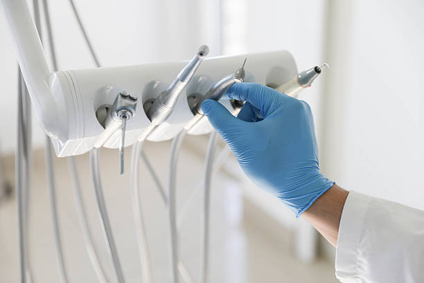 Professional Tooth Extraction technician working in Prince George County County, VA